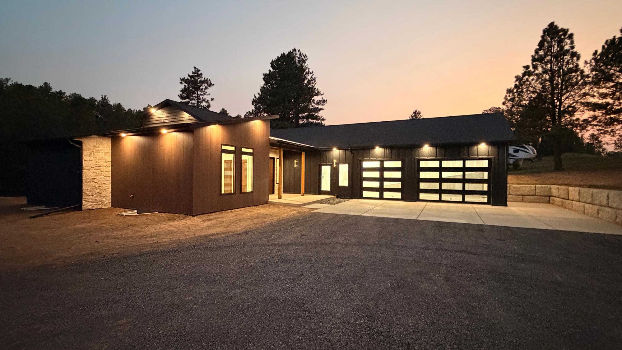 A luxury home in the Black Hills of South Dakota at dusk