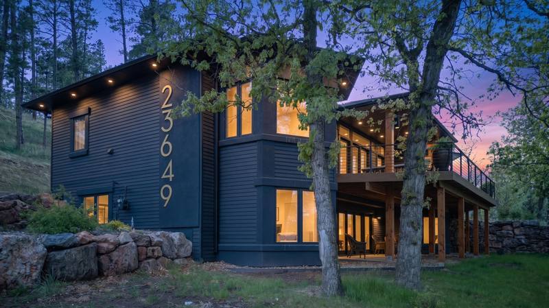 4 bedroom, 2.5 bathroom home at 23649 Wilderness Canyon Rd in Rapid City, SD, 3,573 square feet, 1.97 acres